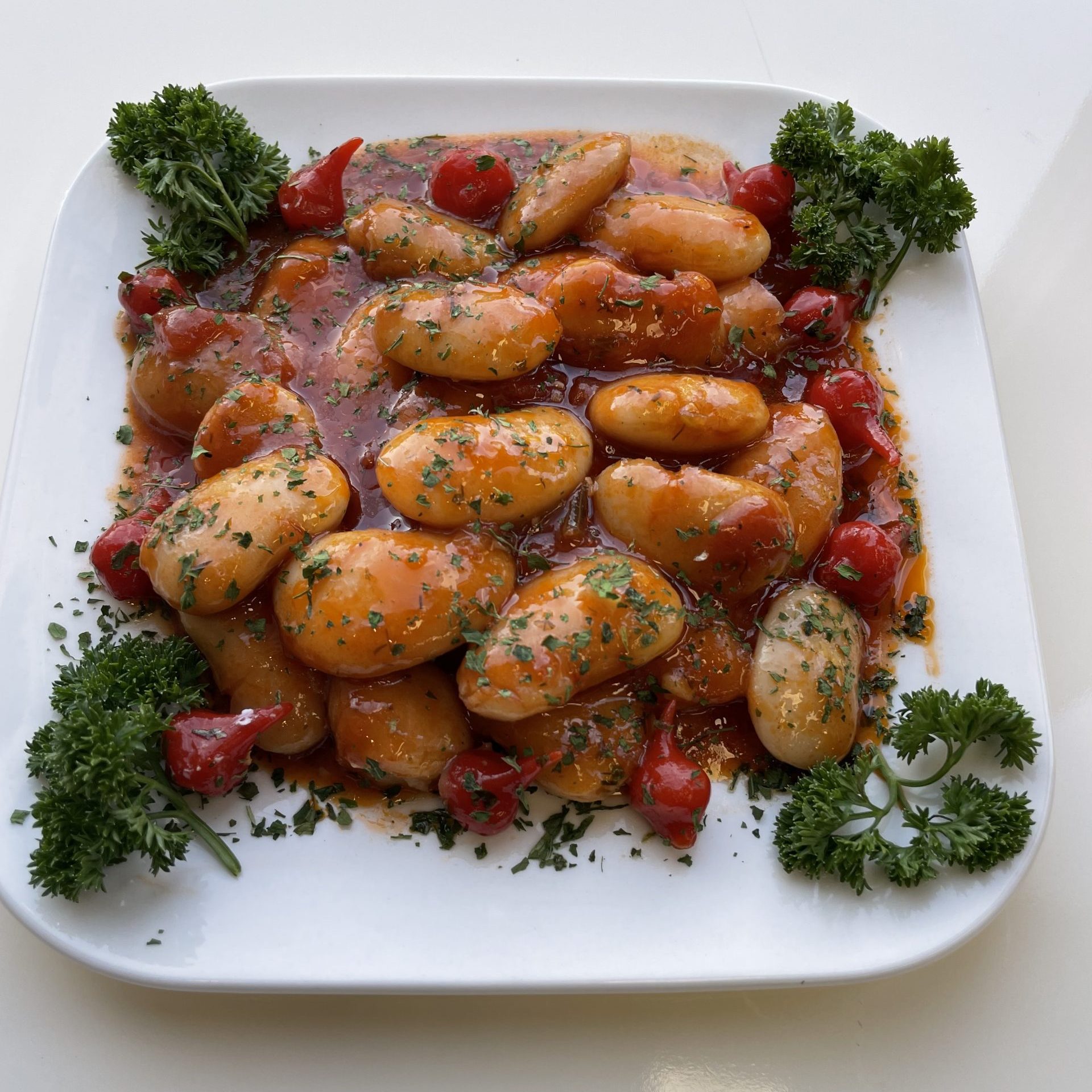 Eingelegte Bohnen in Tomatensoße
