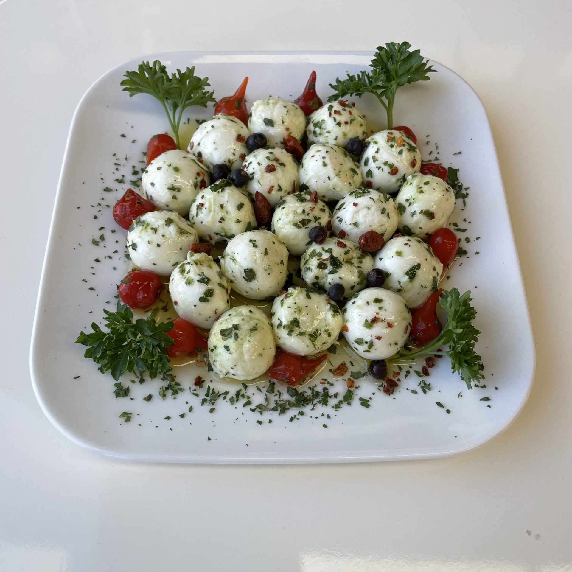Mozarella Bällchen in Bärlauchmarinade